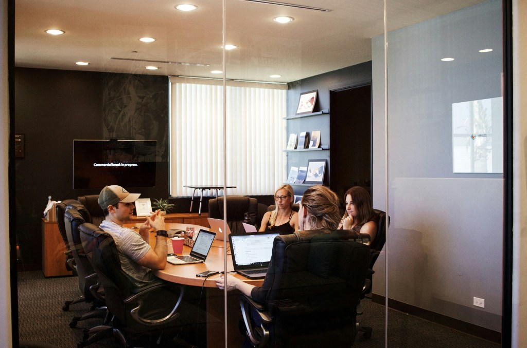 Team members reviewing ideas together during a planning session
